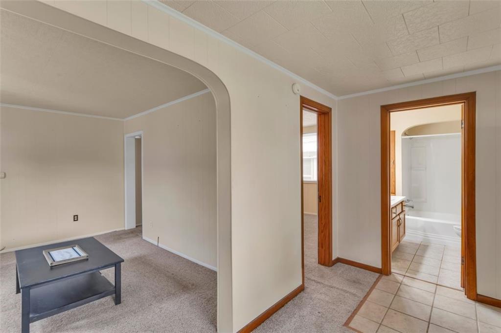 323 Sycamore Street Vandergrift, PA 15690 - Photo 7 of 28 a view of a livingroom with wooden floor