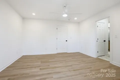 a view of a room with racks on the wall