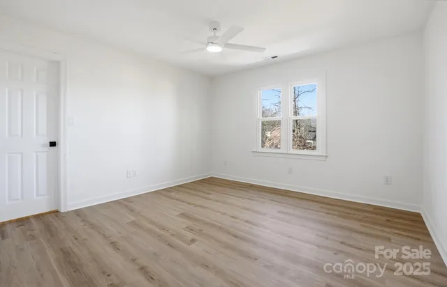 a view of a room with storage and utility room