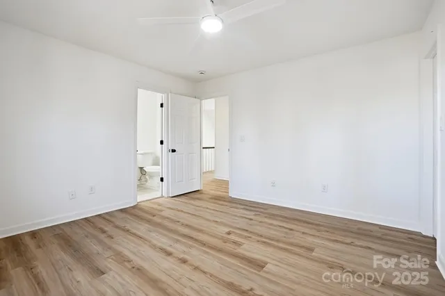a view of kitchen with furniture and a potted plant