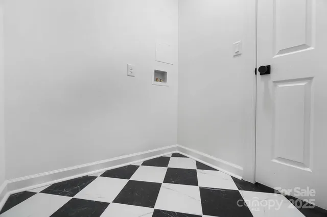 a black and white checkered floor with a black white checkered floor