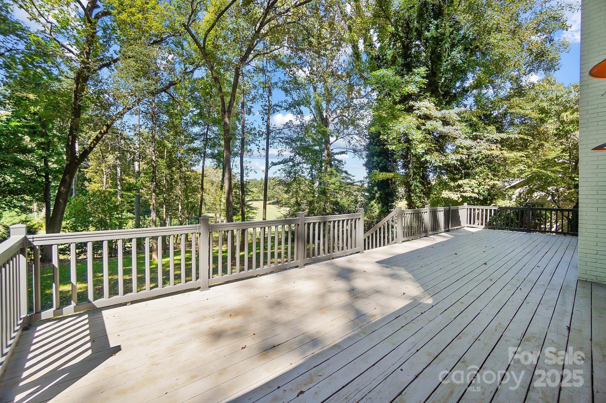 3323 Lincoln Lane Gastonia, NC 28056 - Photo 38 of 47 a view of balcony with wooden floor and fence