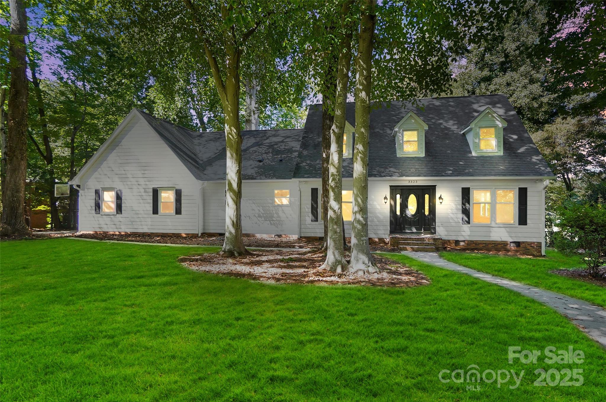 3323 Lincoln Lane Gastonia, NC 28056 - Photo 47 of 47 a front view of a house with garden