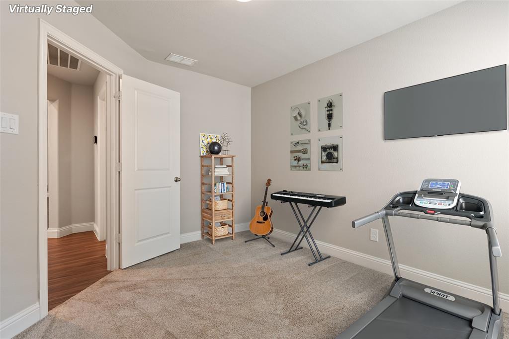 6909 Danridge Road Rowlett, TX 75089 - Photo 21 of 29 a view of a livingroom with furniture