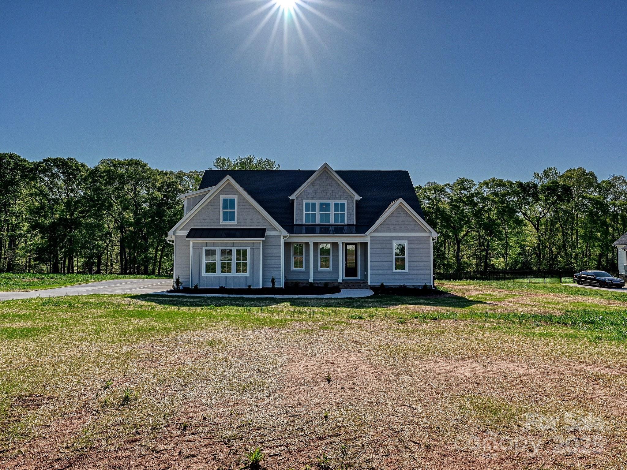 215 Triple Ponds Court Clover, SC 29710 - Photo 1 of 32 a front view of a house with a yard