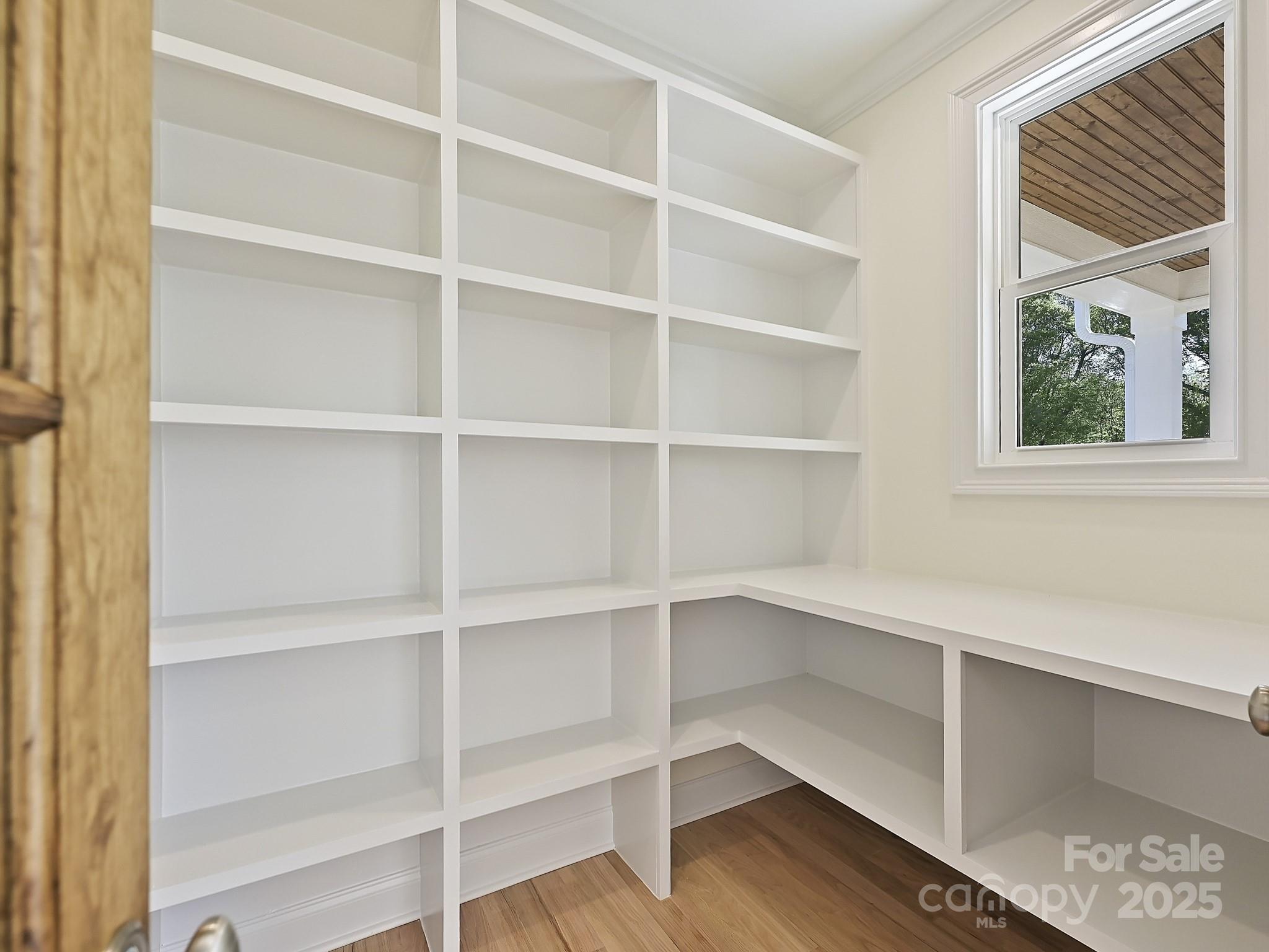 215 Triple Ponds Court Clover, SC 29710 - Photo 14 of 32 a view of walk in closet with empty racks