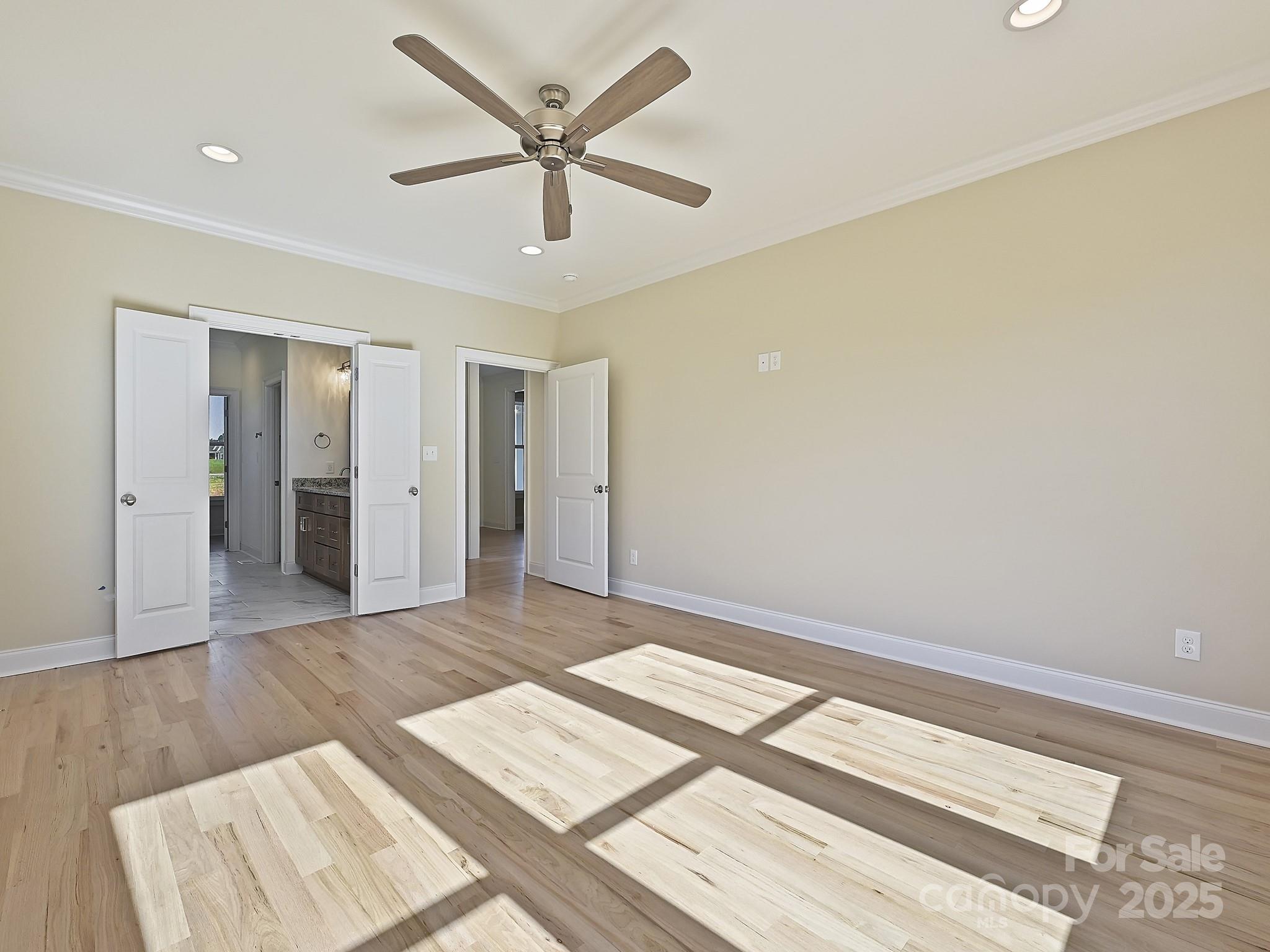215 Triple Ponds Court Clover, SC 29710 - Photo 19 of 32 a view of an empty room and wooden floor