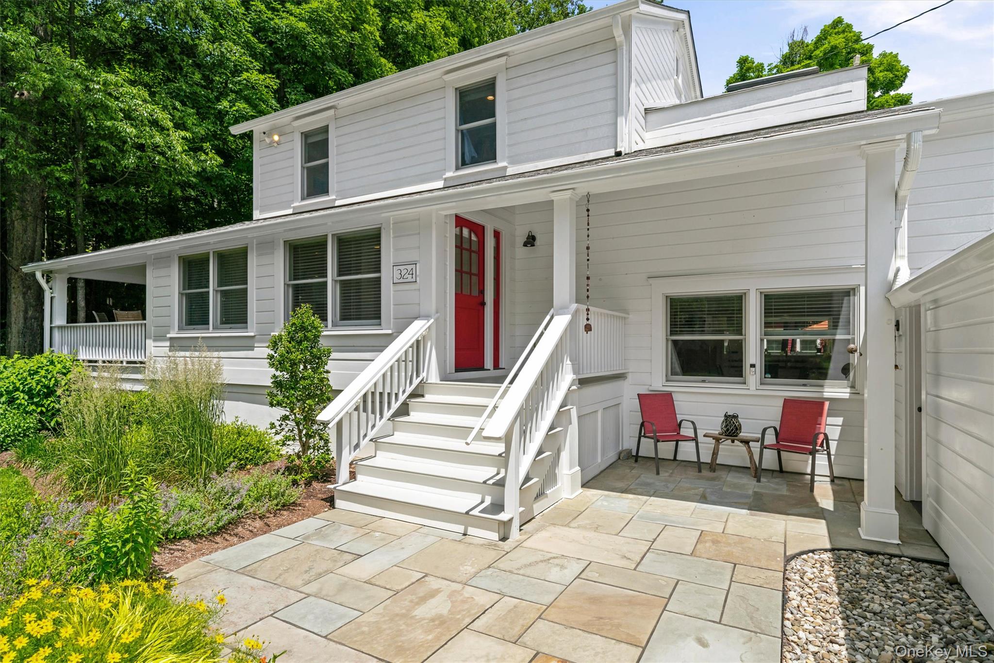 324 Haverstraw Road Suffern, NY 10901 - Photo 5 of 50 a view of a house with backyard and sitting area