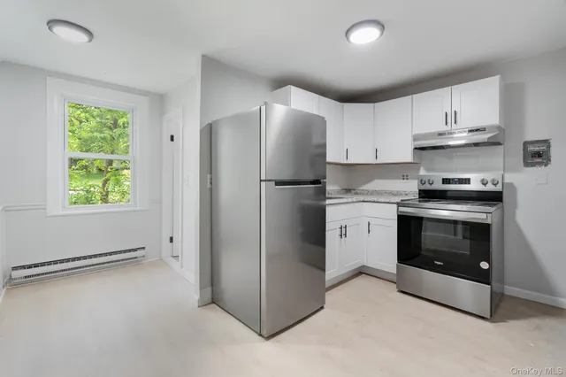 a view of a room with a window