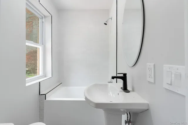 a bathroom with a sink and a toilet