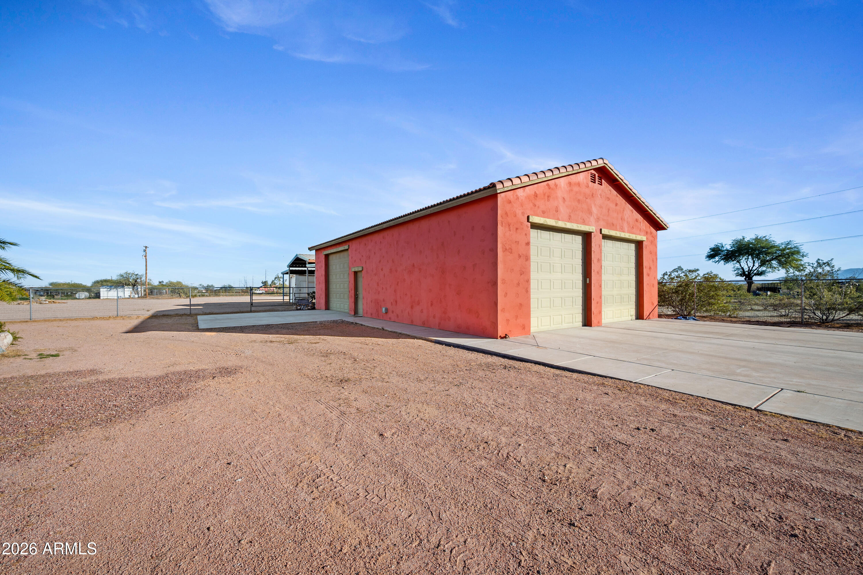 8679 North Warren Road Maricopa, AZ 85139 - Photo 19 of 40 a view of backyard of house