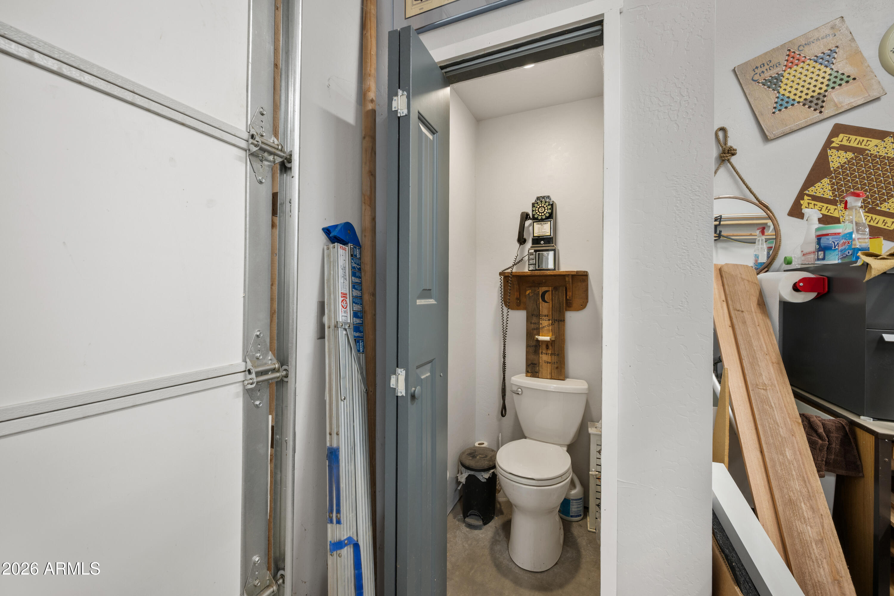 8679 North Warren Road Maricopa, AZ 85139 - Photo 21 of 40 a bathroom with a toilet and a shower