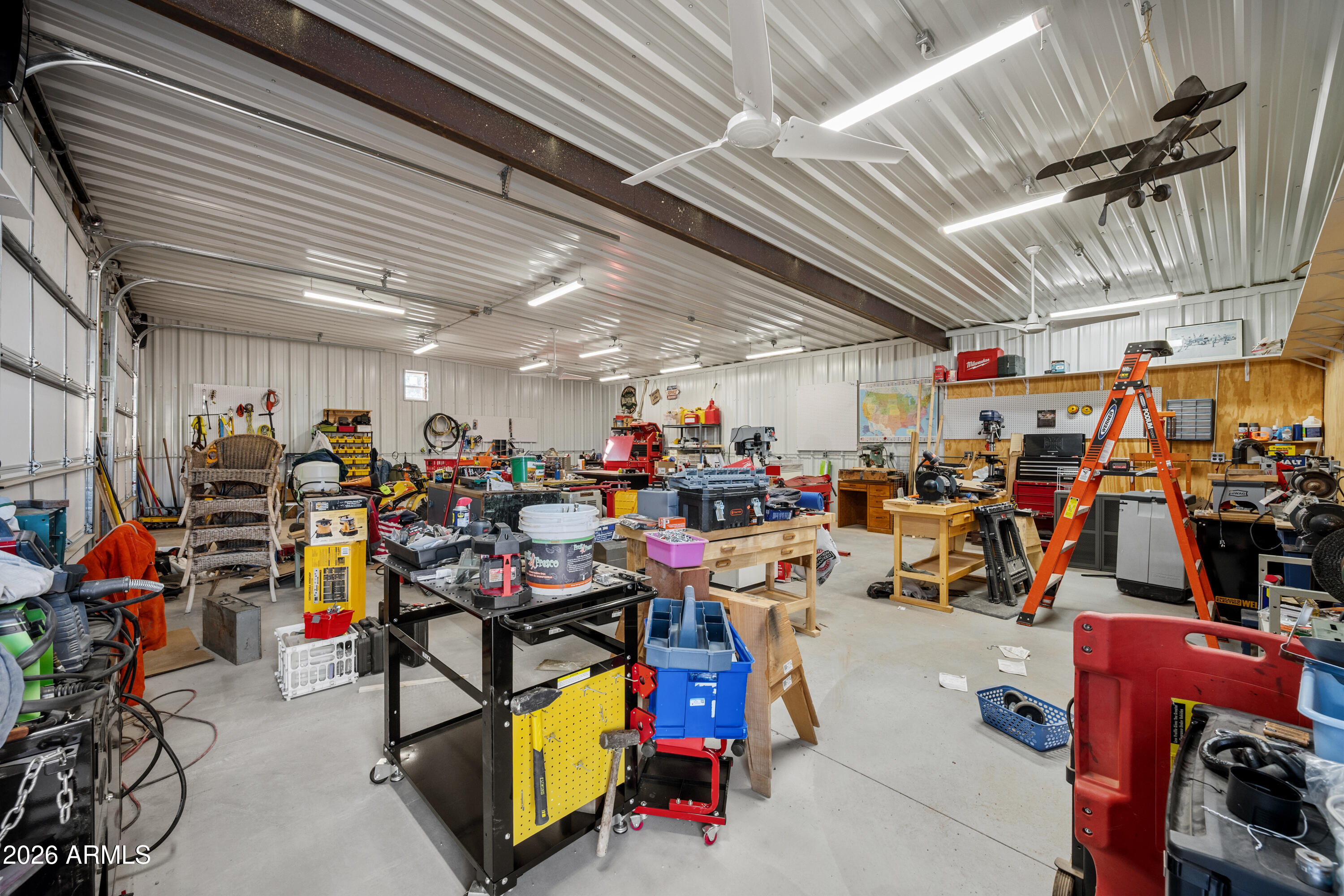 8679 North Warren Road Maricopa, AZ 85139 - Photo 24 of 40 a view of a storage room with racks