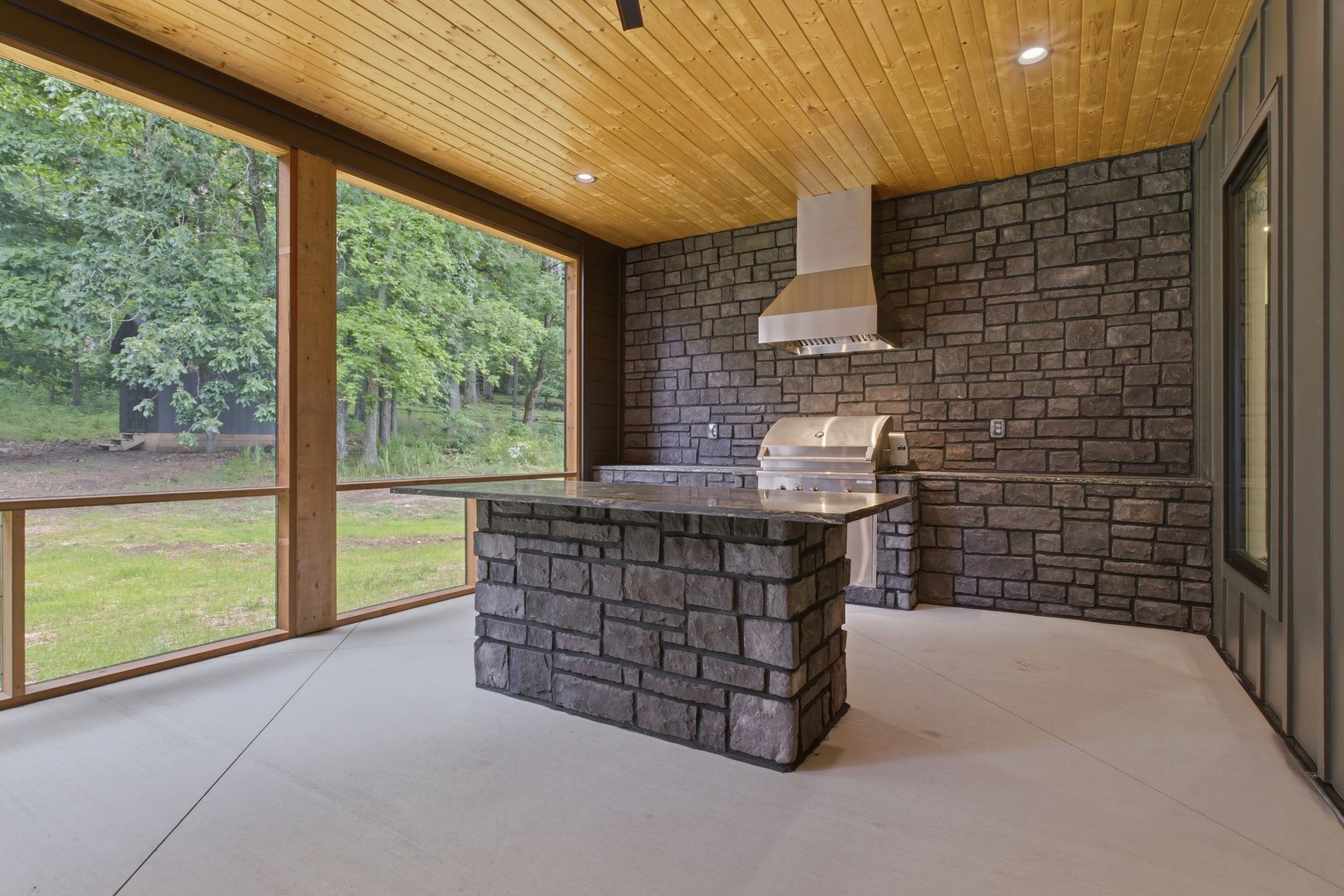 1002 Waller Road Brentwood, TN 37027 - Photo 49 of 54 a area with furniture in front of a house
