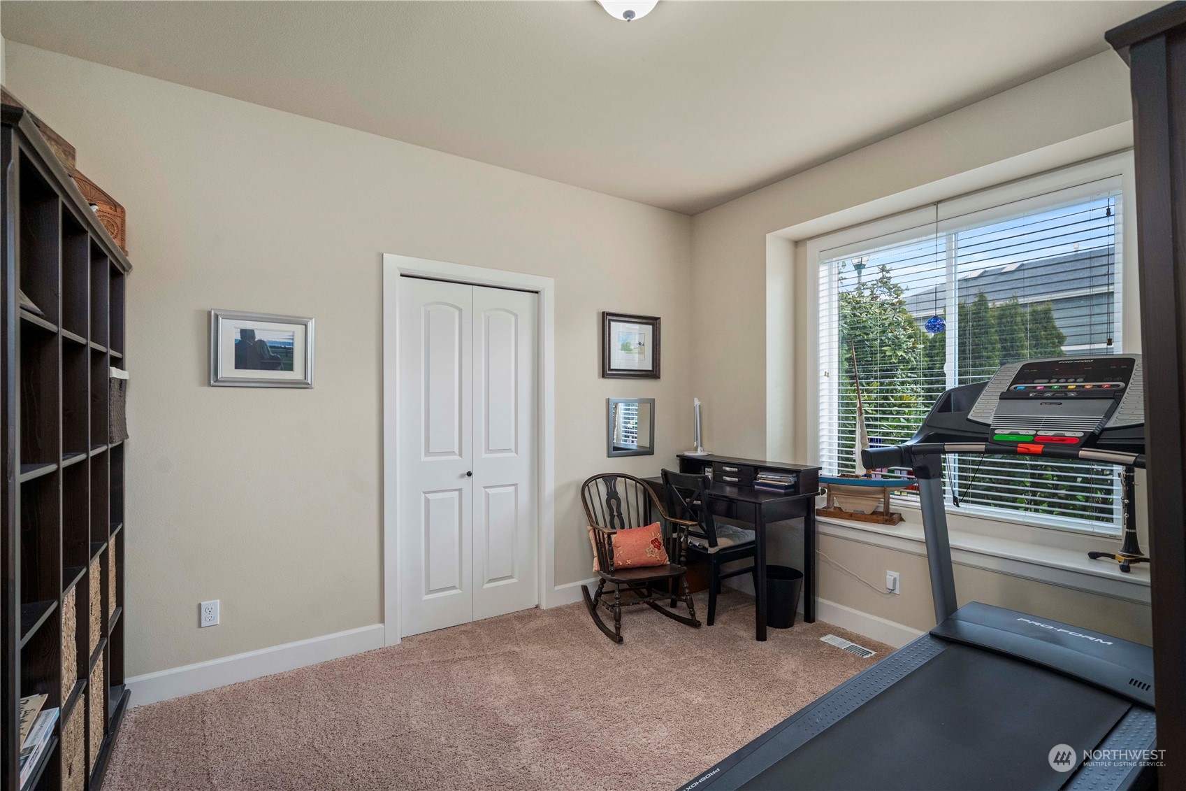 6765 Southeast 2nd Street Renton, WA 98059 - Photo 17 of 36 a living room with furniture and large windows