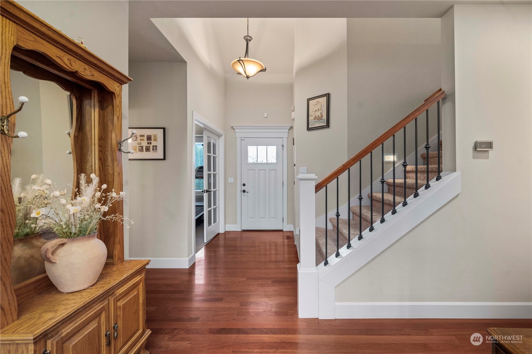 6765 Southeast 2nd Street Renton, WA 98059 - Photo 19 of 36 a view of entryway and hall with wooden floor
