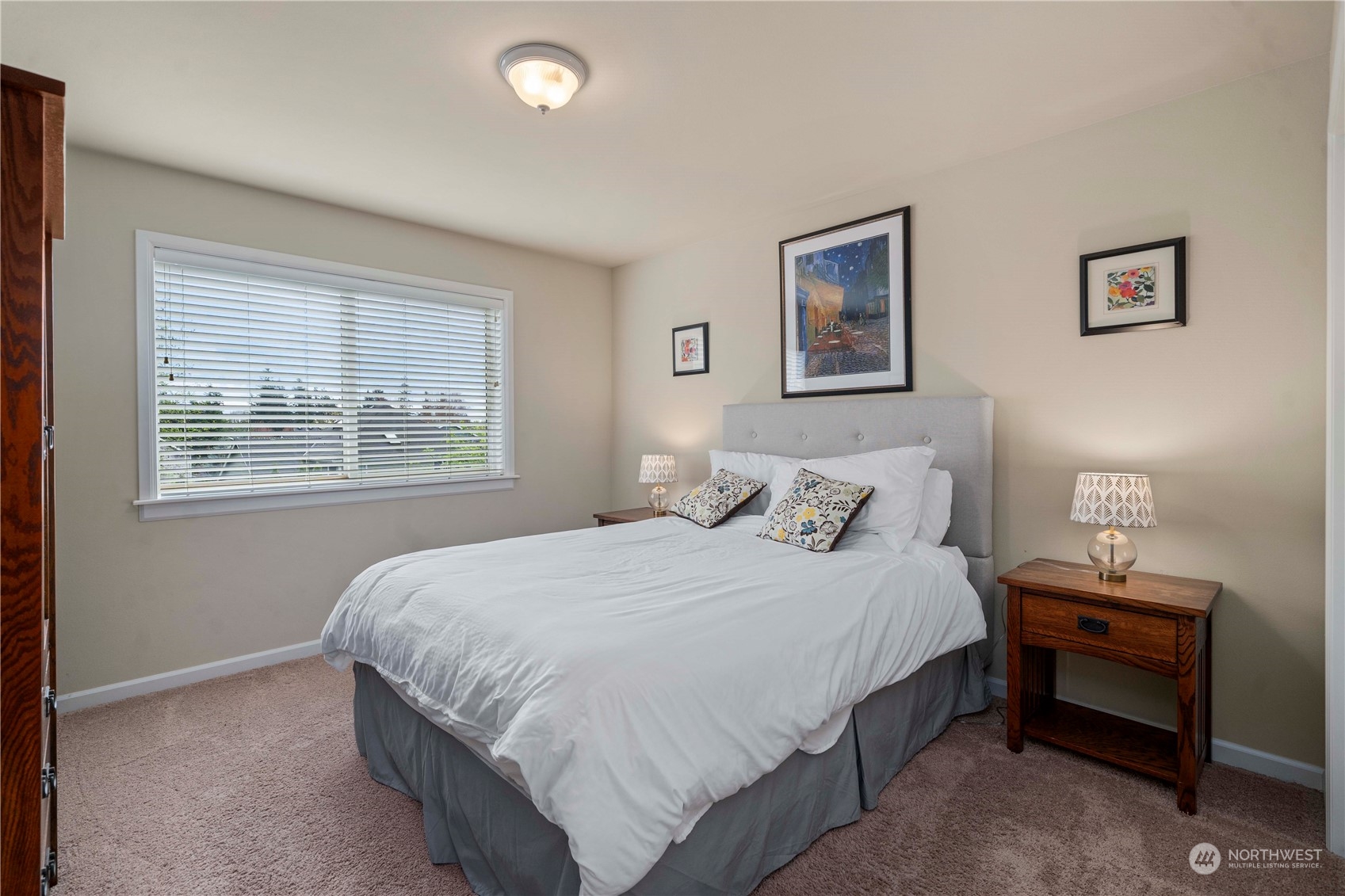 6765 Southeast 2nd Street Renton, WA 98059 - Photo 28 of 36 a bedroom with a bed and a window