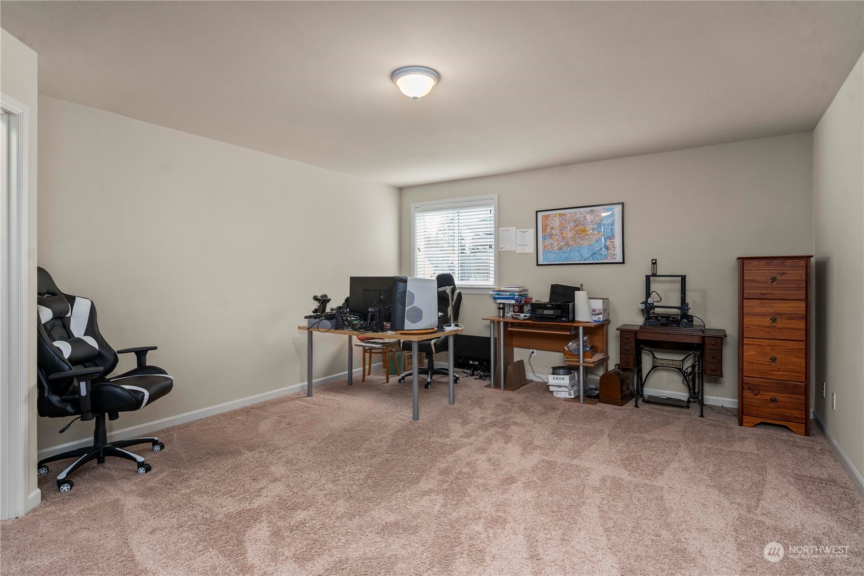 6765 Southeast 2nd Street Renton, WA 98059 - Photo 30 of 36 a view of a workspace with furniture
