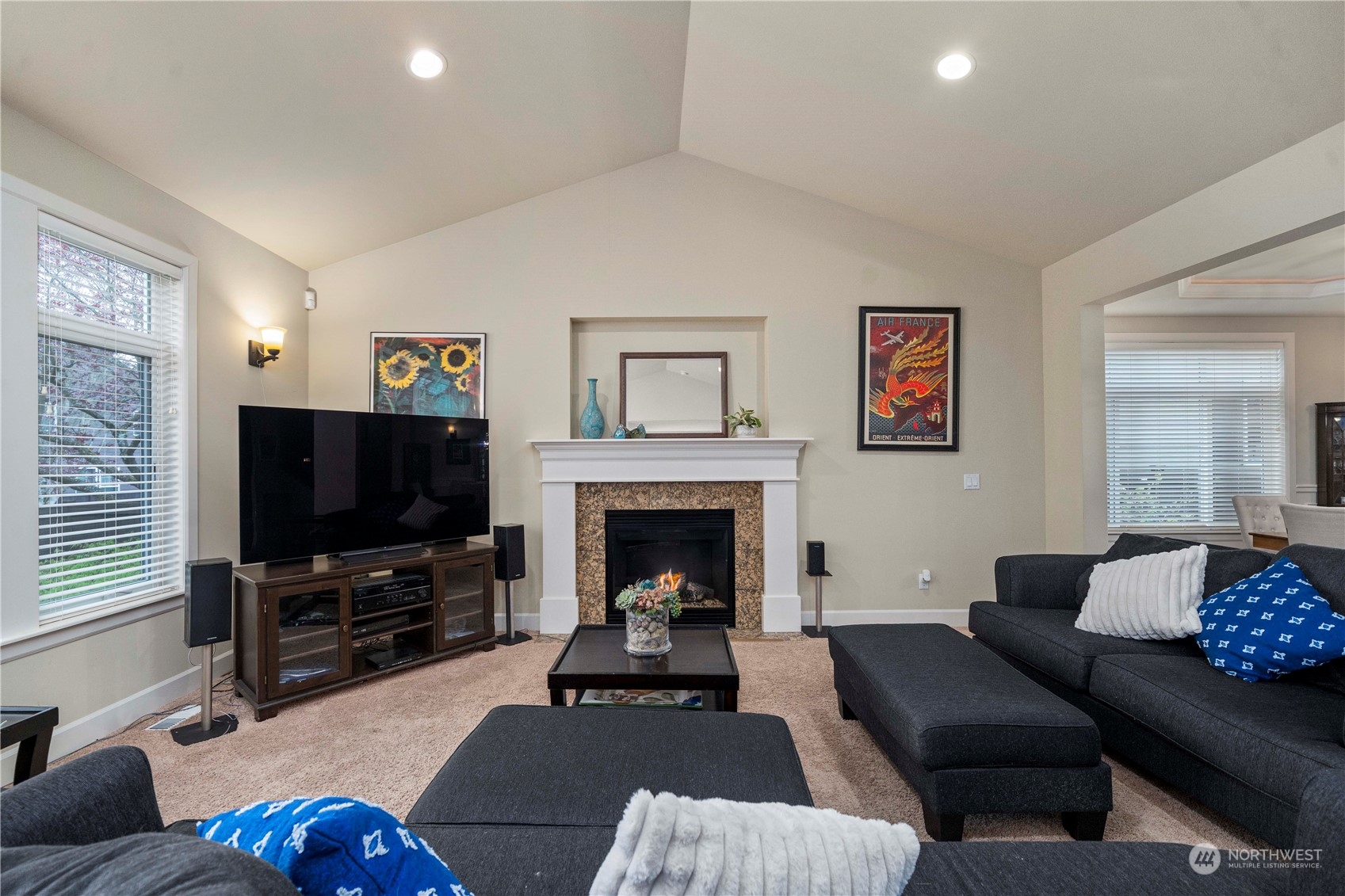 6765 Southeast 2nd Street Renton, WA 98059 - Photo 6 of 36 a living room with furniture and a fireplace