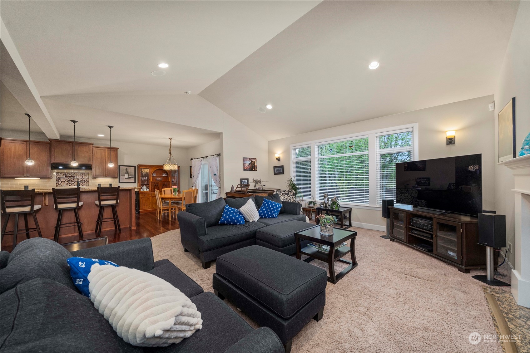 6765 Southeast 2nd Street Renton, WA 98059 - Photo 7 of 36 a living room with furniture and a flat screen tv