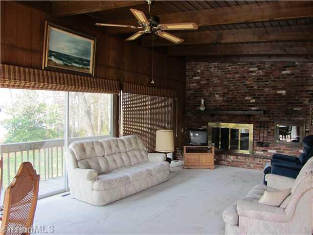 2318 Beckner Road Lexington, NC 27292 - Photo 5 of 9 Den/Family/Great Room. Great Room with Fireplace and Separate Cooking Closed-In Pit