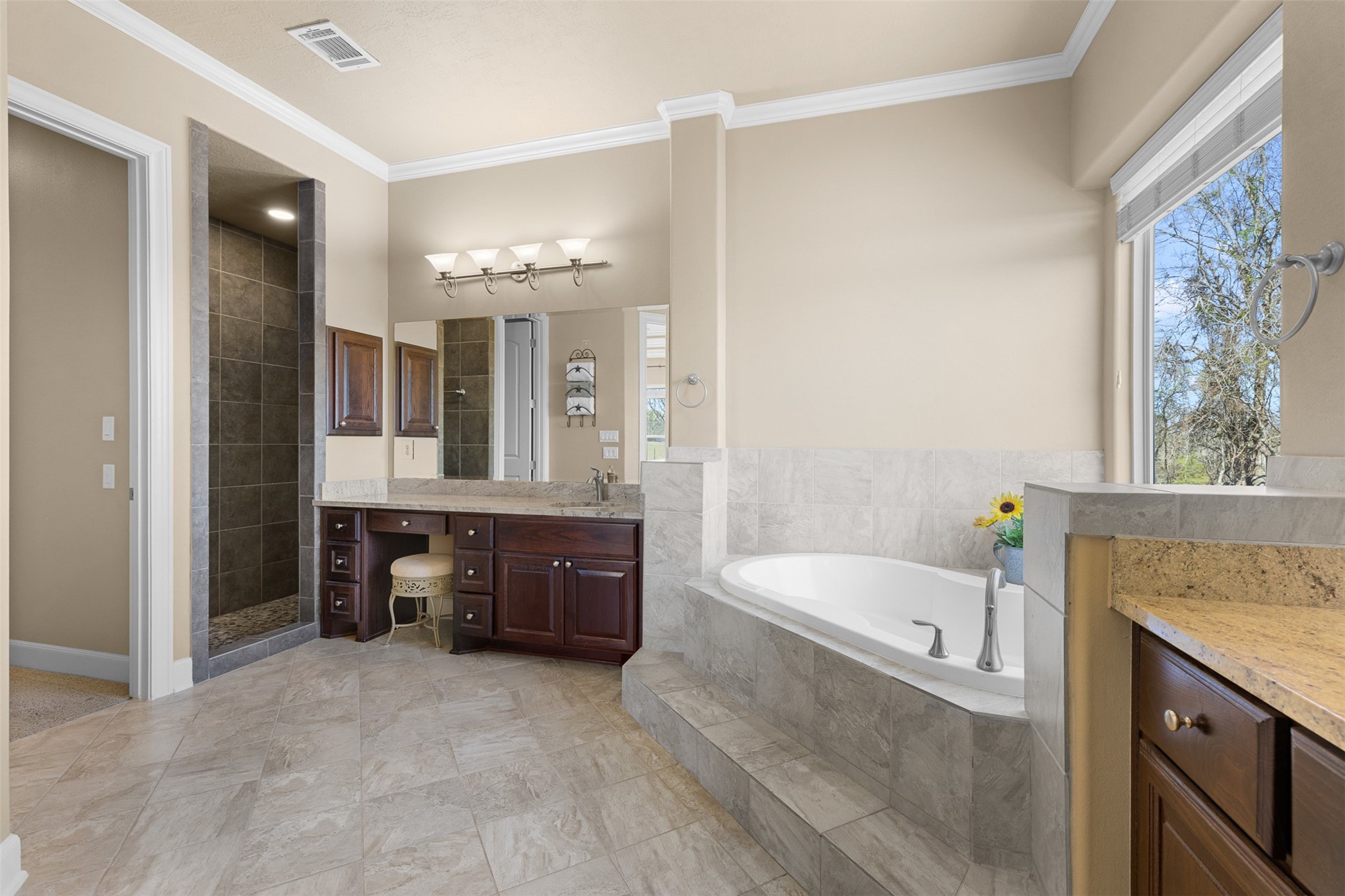 1813 Cemetery Road Bellville, TX 77418 - Photo 13 of 27 a bathroom with a tub sink shower and mirror