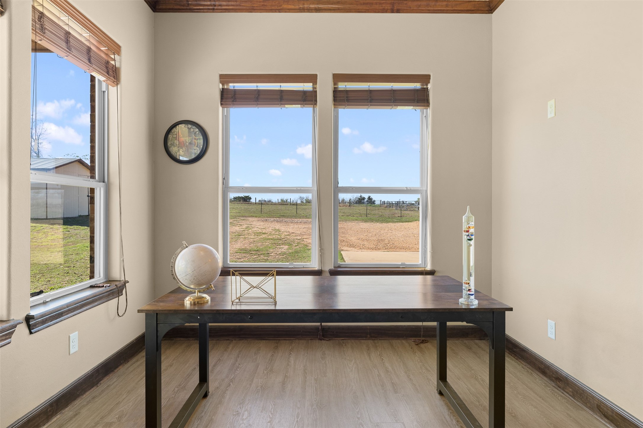 1813 Cemetery Road Bellville, TX 77418 - Photo 17 of 27 a view of room with window and wooden floor