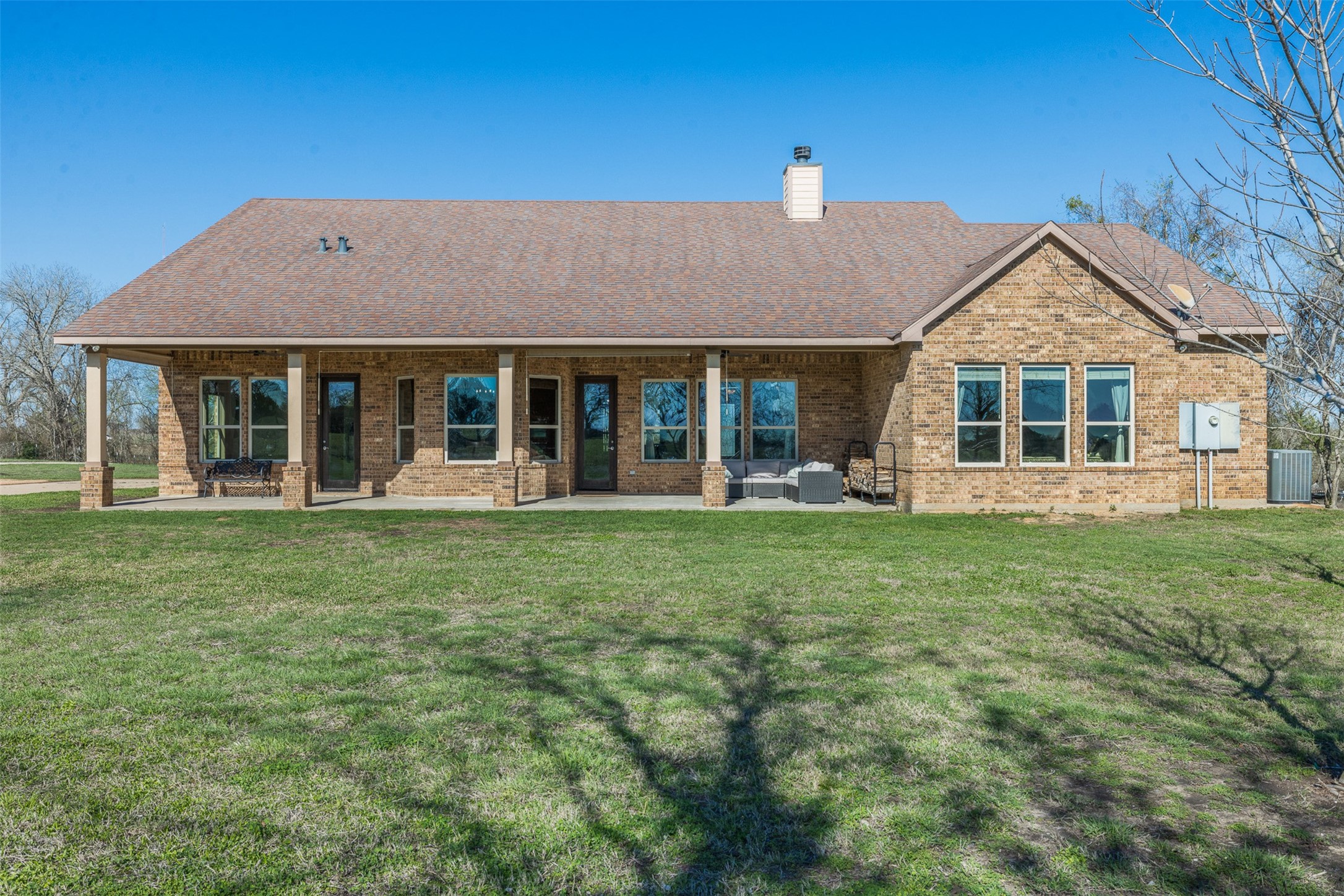 1813 Cemetery Road Bellville, TX 77418 - Photo 20 of 26 front view of a house with a yard