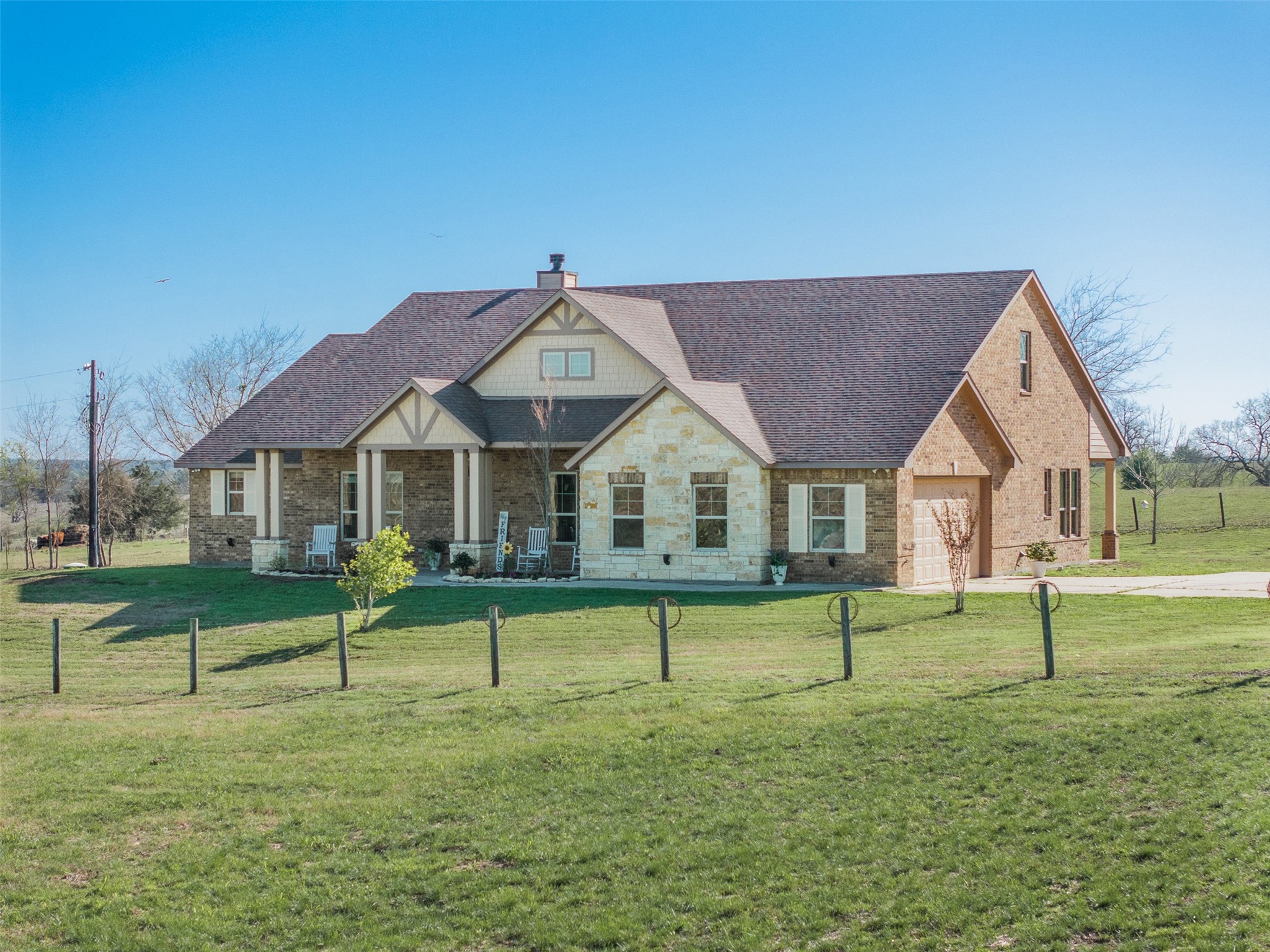 1813 Cemetery Road Bellville, TX 77418 - Photo 2 of 27 a view of a house with a yard