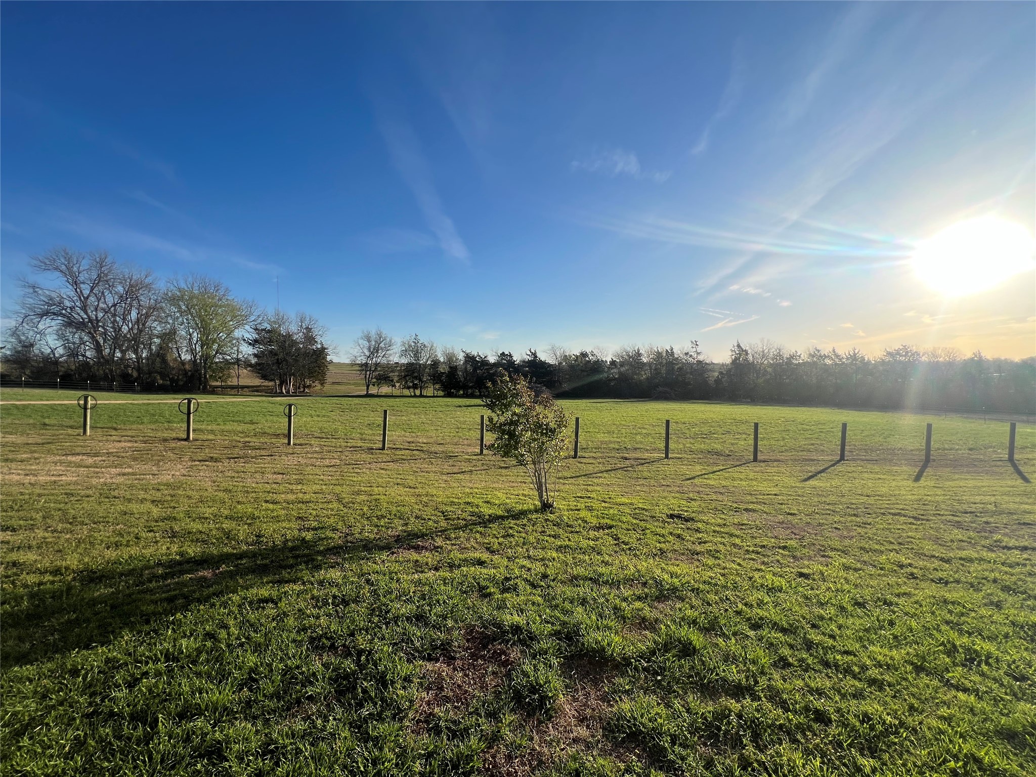 1813 Cemetery Road Bellville, TX 77418 - Photo 25 of 26 a view of a lake with houses in the background
