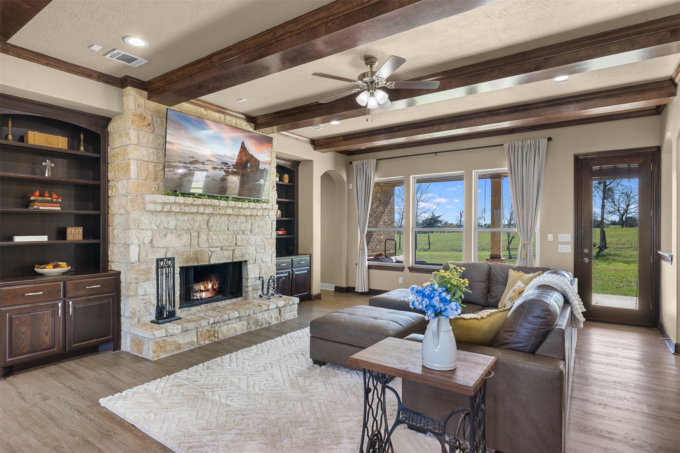 1813 Cemetery Road Bellville, TX 77418 - Photo 5 of 27 a living room with furniture and a fireplace