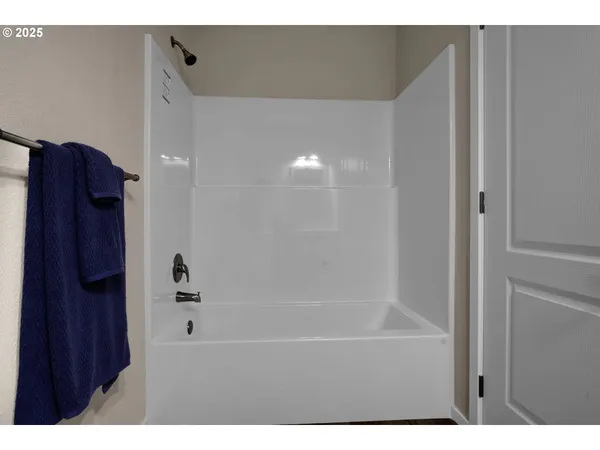 a bathroom with a bathtub