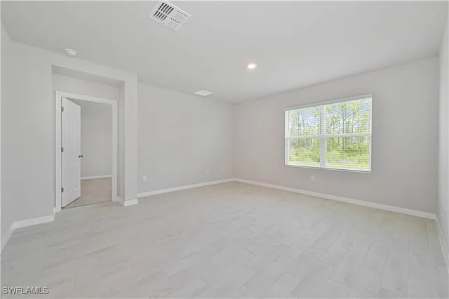 an empty room with windows