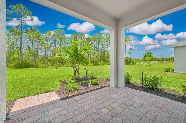 a view of swimming pool with a yard