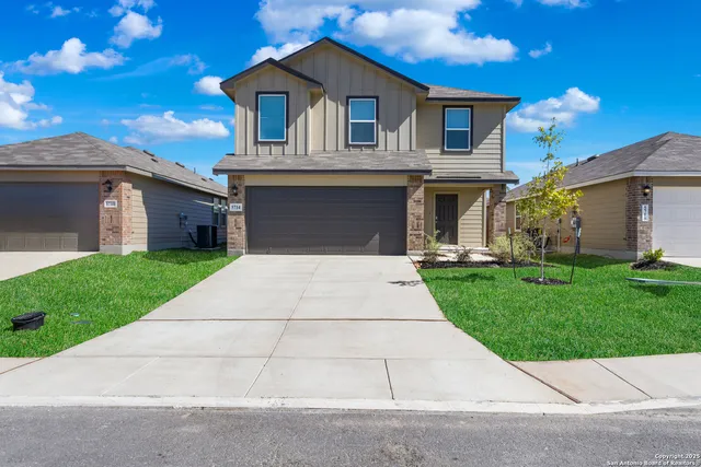 a front view of house with yard