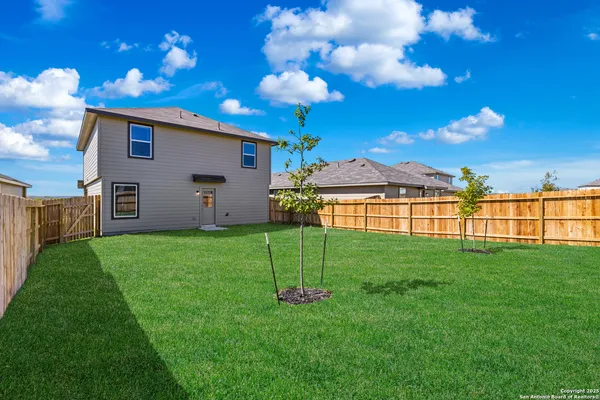 a view of a backyard with a garden