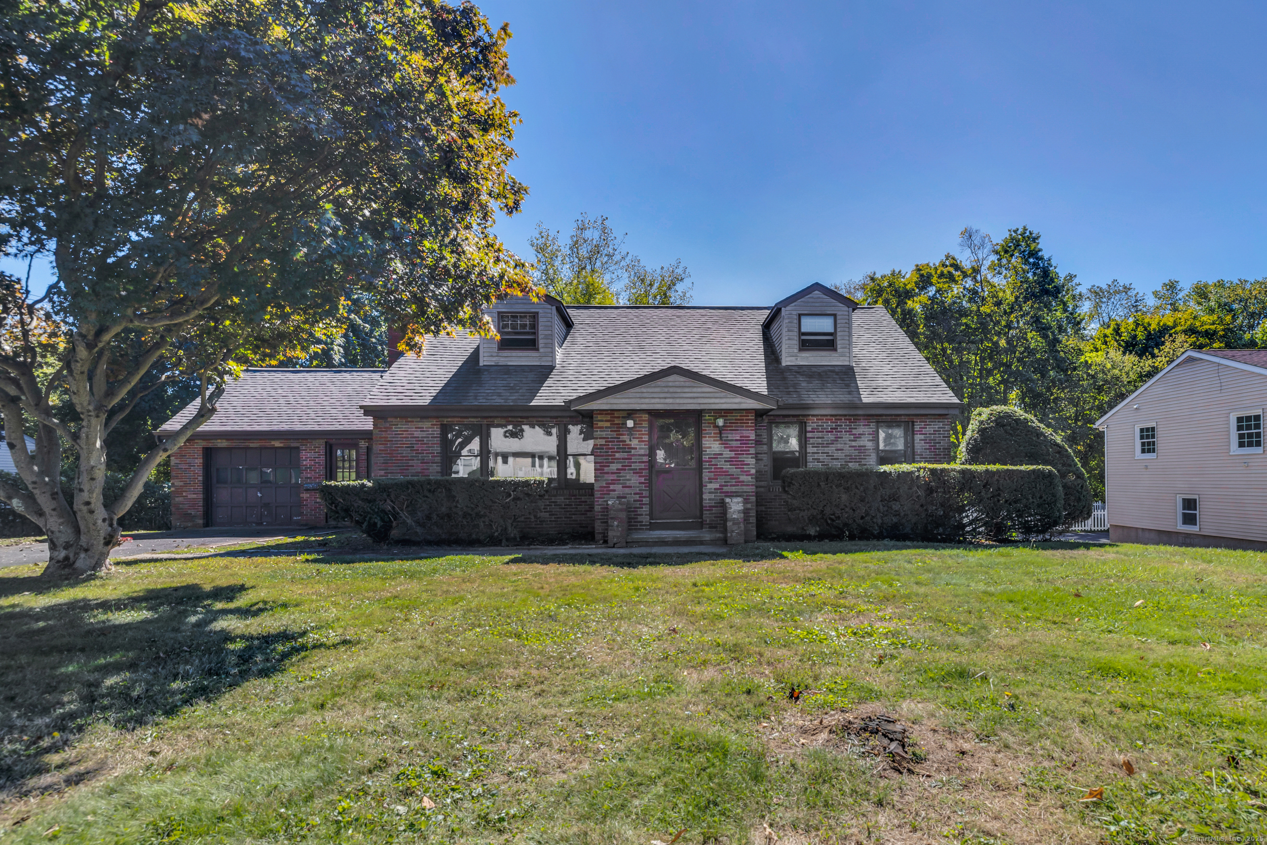 a view of a house with a big yard