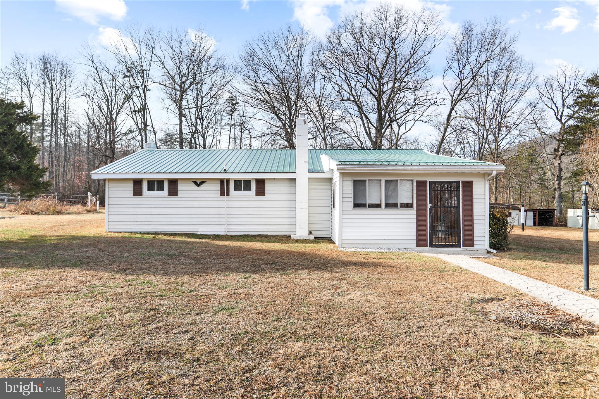 146 Miracle Drive Springfield, WV 26763 - Photo 1 of 40 front view of a house with a yard