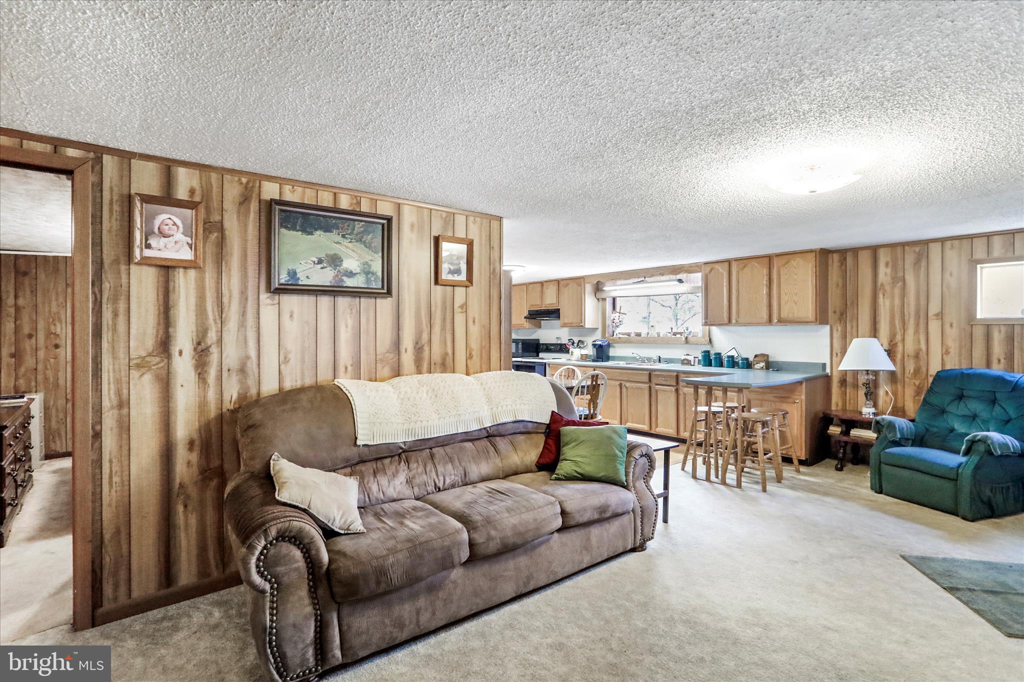 146 Miracle Drive Springfield, WV 26763 - Photo 5 of 40 a living room with furniture and a large window