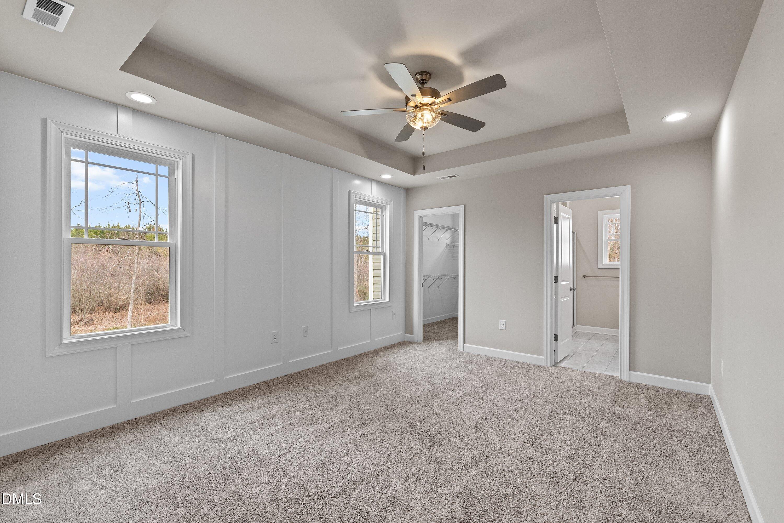 1117 Nor-Am Road Pikeville, NC 27863 - Photo 22 of 34 a view of an empty room with chandelier fan and fire place