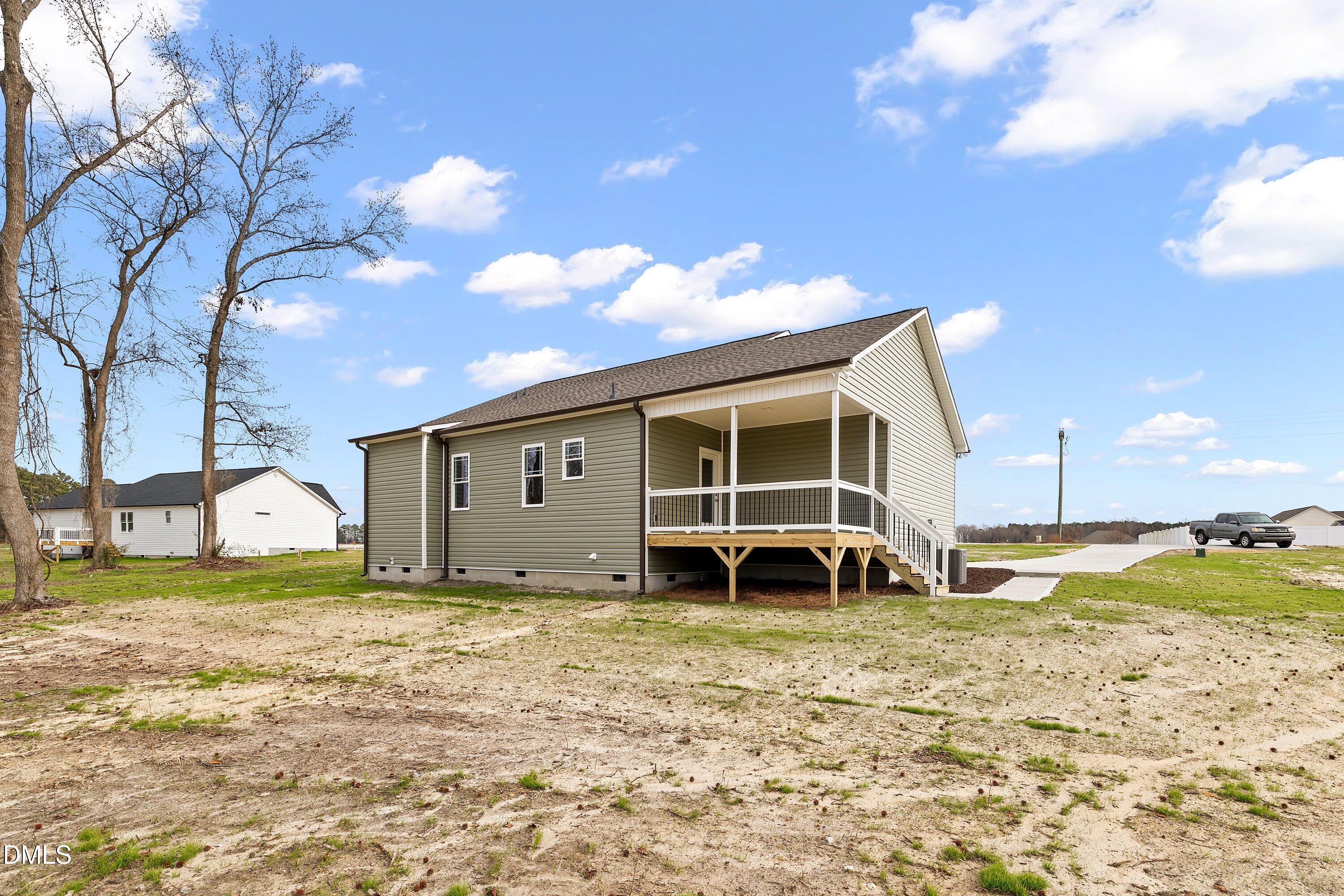 1117 Nor-Am Road Pikeville, NC 27863 - Photo 31 of 34 a view of a house with a yard