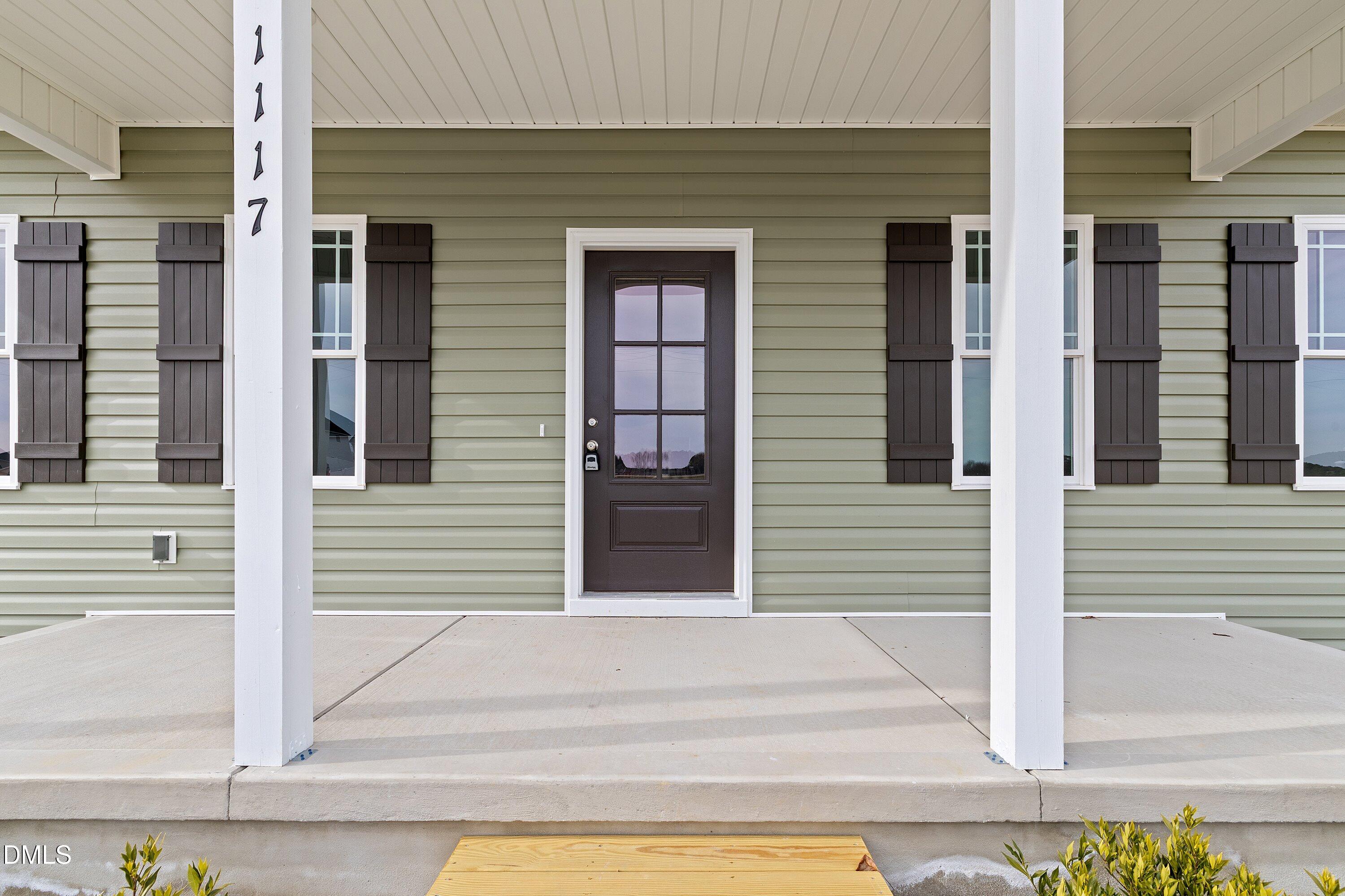1117 Nor-Am Road Pikeville, NC 27863 - Photo 6 of 34 a view of a house with entrance and door