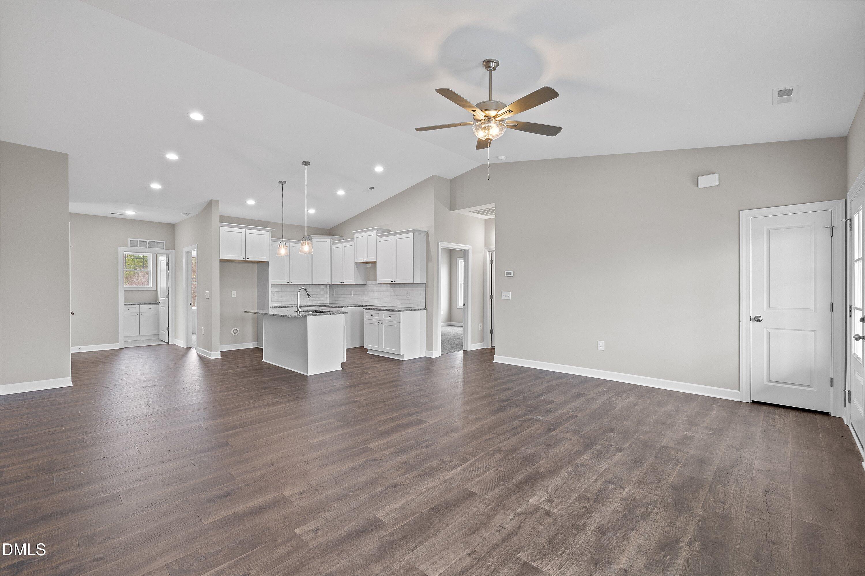 1117 Nor-Am Road Pikeville, NC 27863 - Photo 8 of 34 a view of an empty room with wooden floor