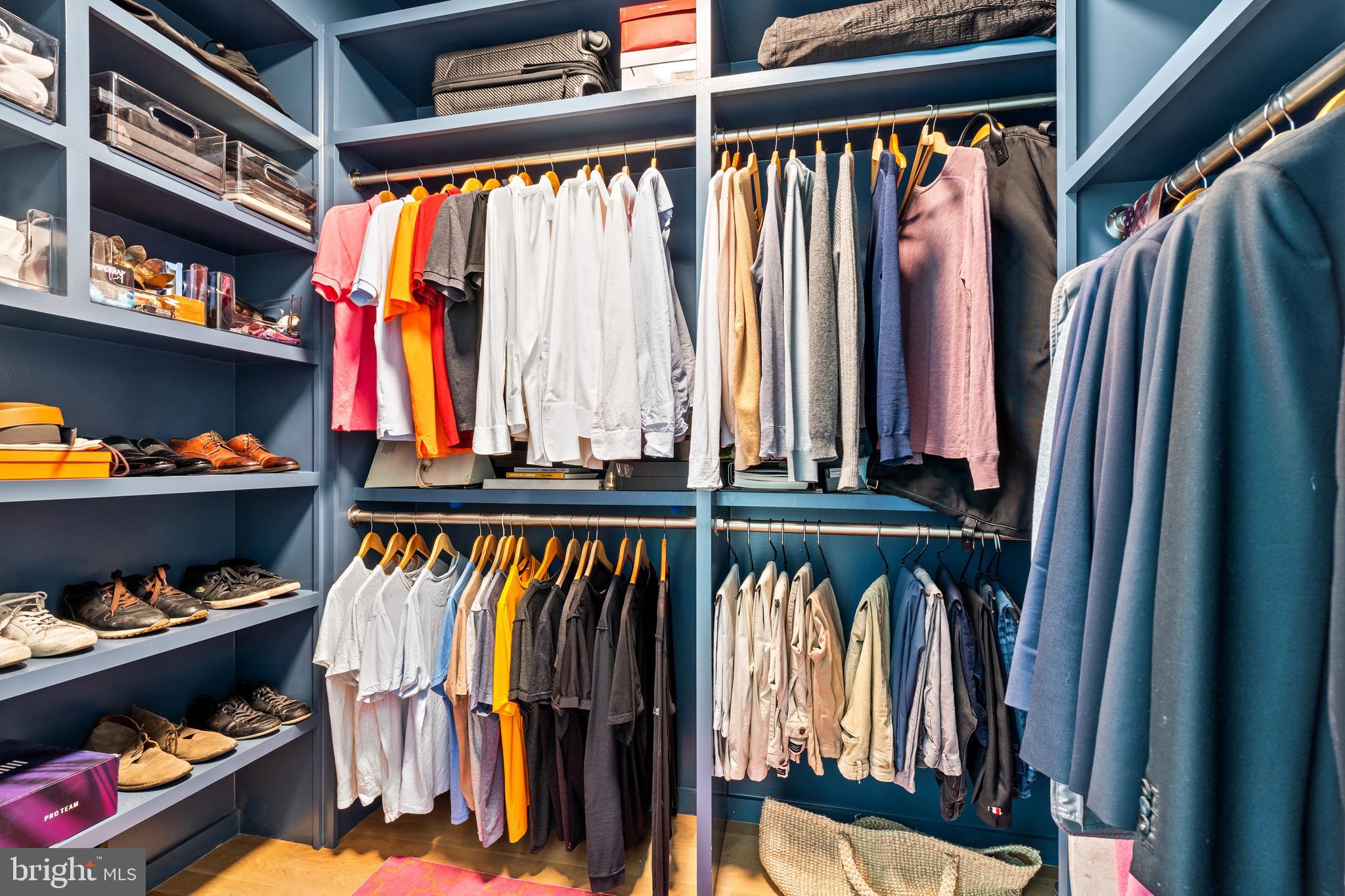 1202 T Street Northwest, Unit 1 Washington, DC 20009 - Photo 15 of 23 a view of walk in closet with clothes and shoes