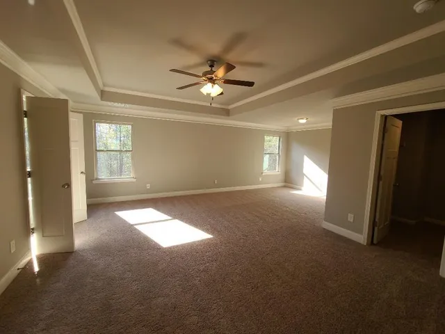 a view of empty room with windows