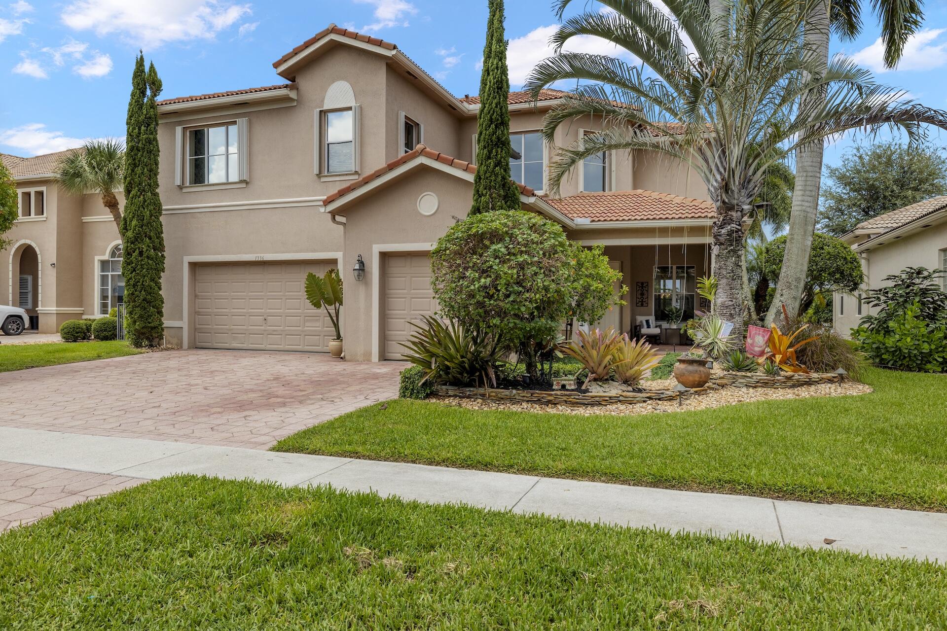 1336 Beacon Circle Wellington, FL 33414 - Photo 2 of 40 exterior front