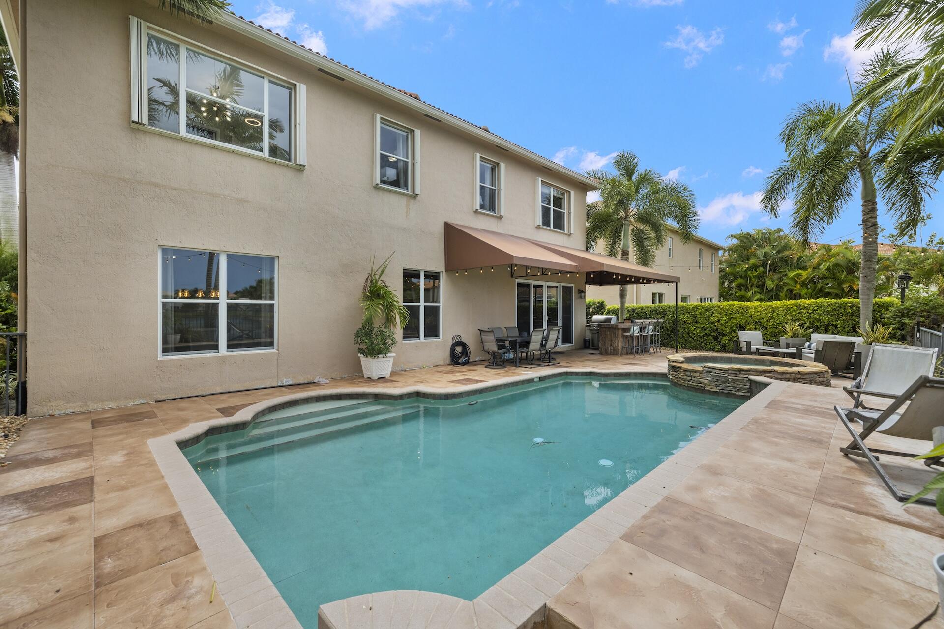 1336 Beacon Circle Wellington, FL 33414 - Photo 35 of 40 pool/awnings