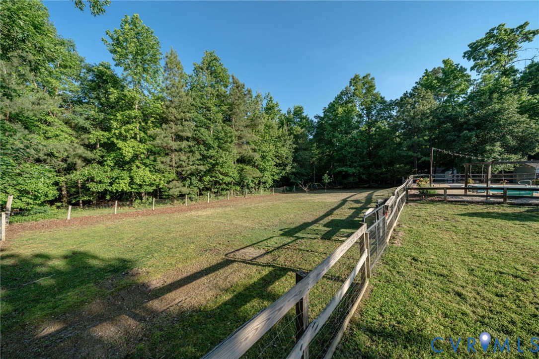 12700 Coalboro Road Chesterfield, VA 23838 - Photo 45 of 50 Fenced green space featuring a wood and wire fence