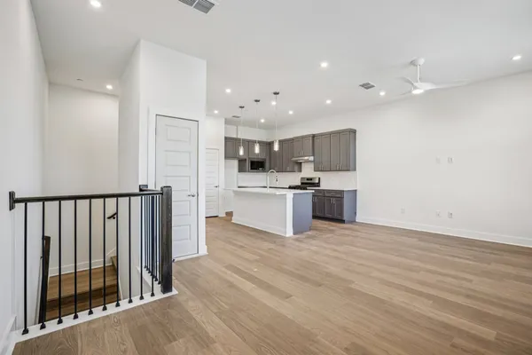 a view of kitchen with wooden floor