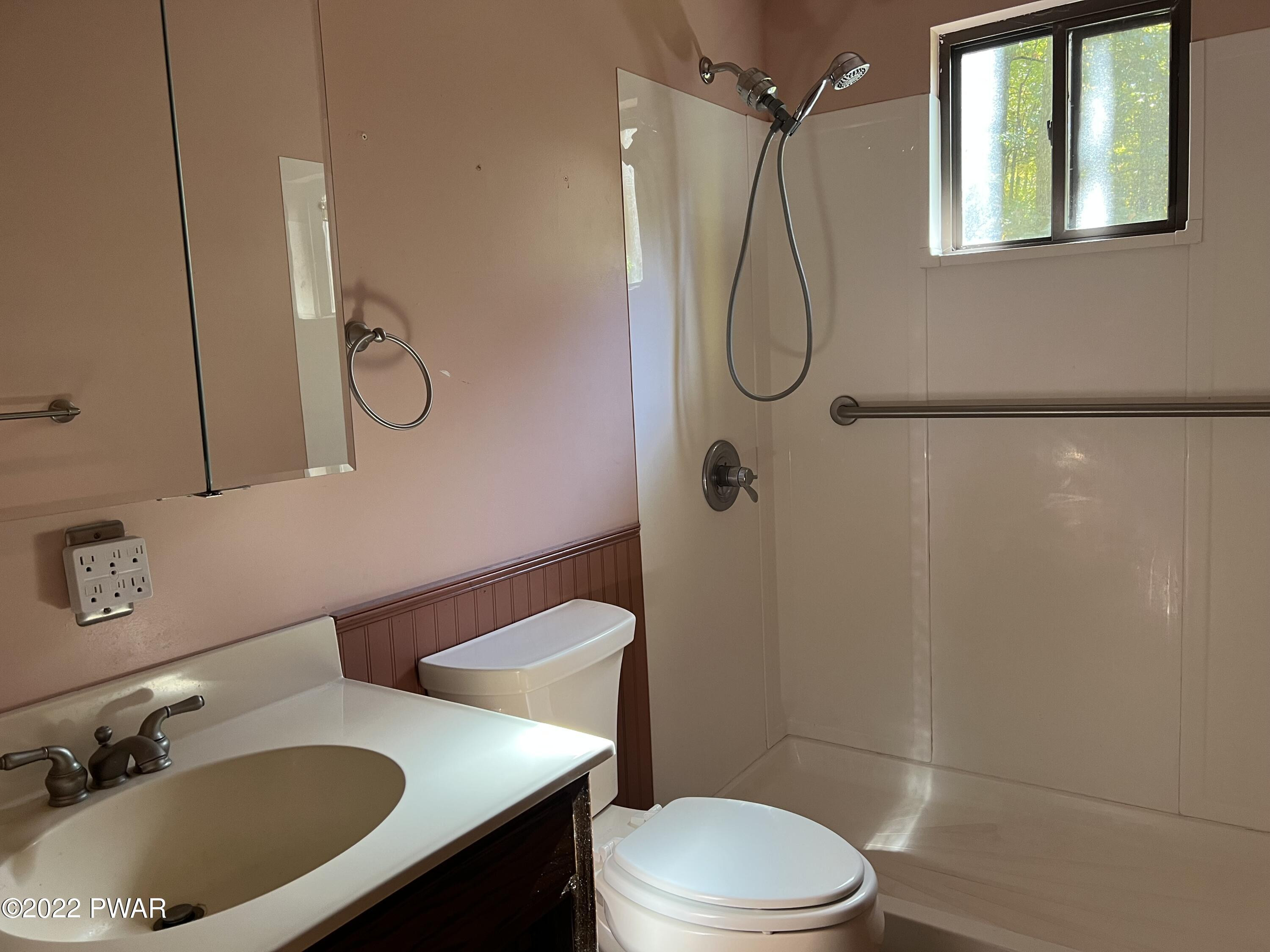 135 Rodeo Drive Hawley, PA 18428 - Photo 22 of 23 a bathroom with a sink toilet and shower